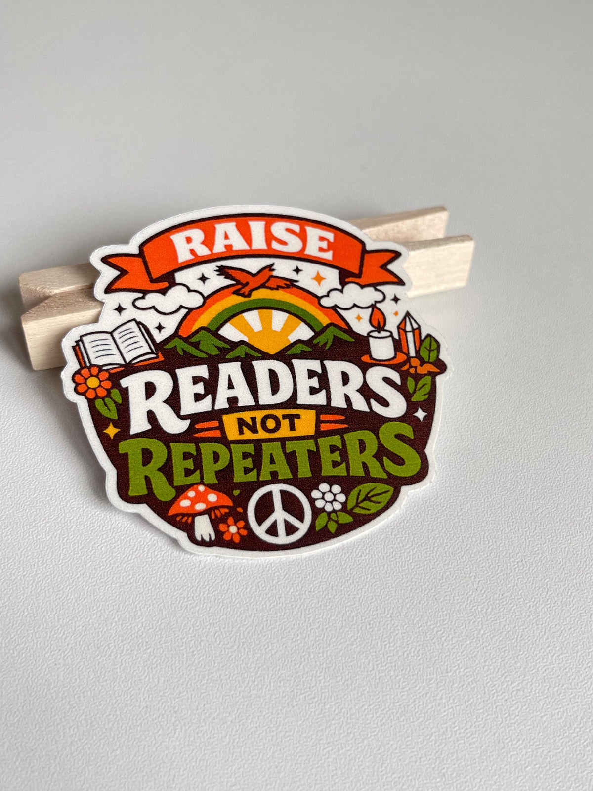 "Raise Readers Not Repeaters" Bright Retro Sticker for Teachers and Parents