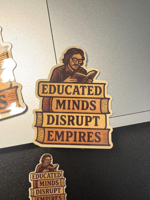 a sticker with the text "EDUCATED MINDS DISRUPT EMPIRES" and an illustration of a person reading a book.