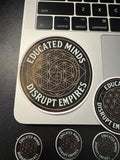 a laptop with several stickers on it, including one that says "EDUCATED MINDS DISRUPT EMPIRES".