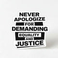 Resistance sticker with bold black text reading 'Never Apologize for Demanding Equality and Justice' on a white background